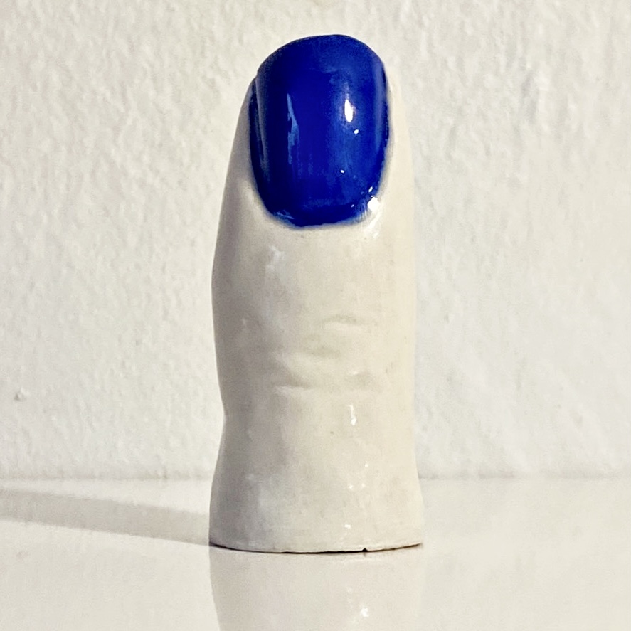 White finger blue nail